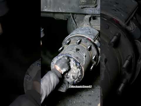 Repairing a Mercedes Rear Axle Oil Leak: Drilling, Threading, and Removing Brake Disc Screws P4