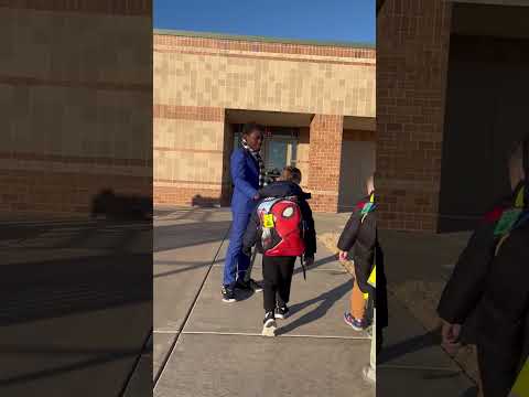 Fifth-grader is enthusiastic greeter for preschool students