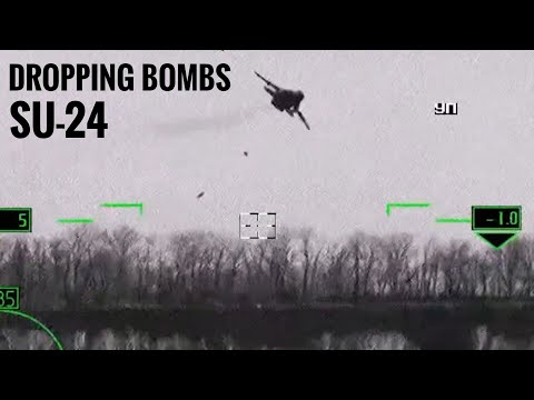 Russian Su-24 fencer dropping Bombs on target and deploying flares in Ukraine.