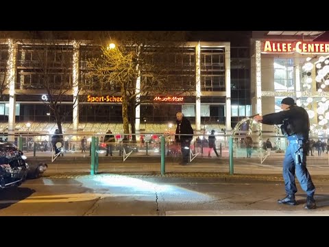 German police detain suspect at gunpoint after car driven into Christmas market | VOA News