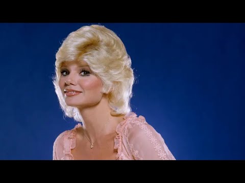 SEXY LONI ANDERSON PHOTOS: ICONIC SEXY PHOTOS