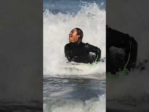 A beautiful surfer found at the beach.￼