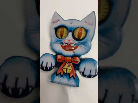 Cat clicker tin toy.