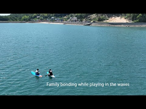 Family bonding while playing in the waves