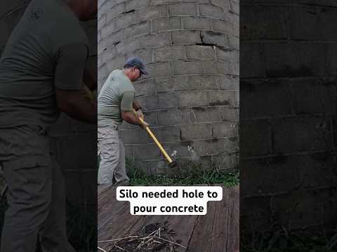 Busting hole in silo with sledge hammer #resourcefullawyer