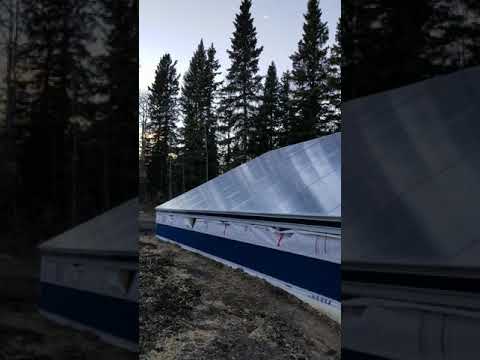 Our Green House Is Clad & Glazed + Installing a Winter Trampoline for the Kids