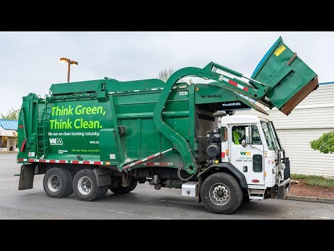 Peterbilt 320 - McNeilus Meridian Front Load Garbage Truck