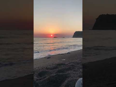 Beautiful sunset view at Buljarica beach in Montenegro filled with relaxing sounds of the sea.