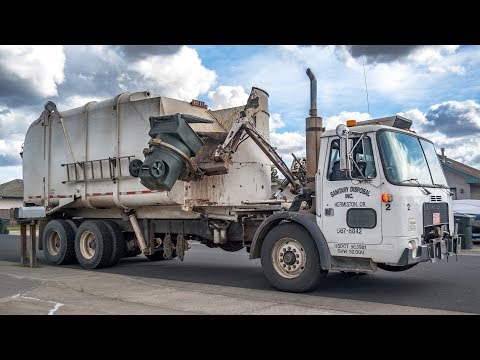 WhiteGMC WXLL - Heil Rapid Rail Garbage Truck