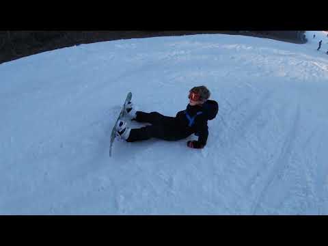 Finn snowboards at Wintergreen resort in the mountains of Virginia