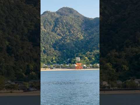 Spectacular view of the Itsukushima Torii gate on Miyajima Island from a ferry in Hiroshima Bay!