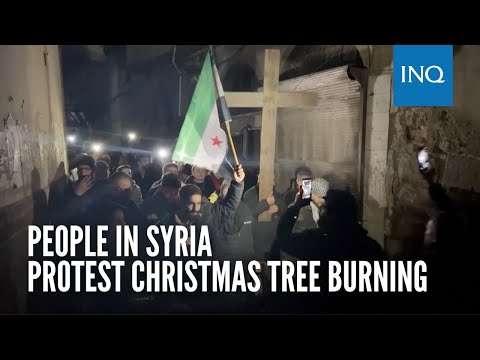 People in Syria protest Christmas tree burning