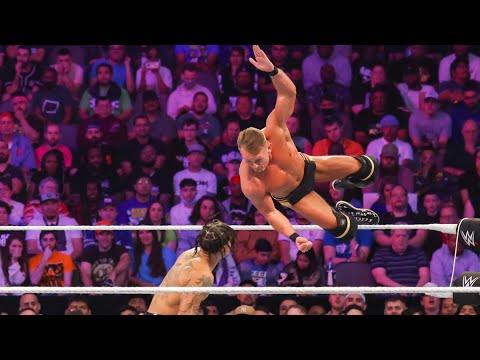 WWE: Diving Back Elbow/Uppercut