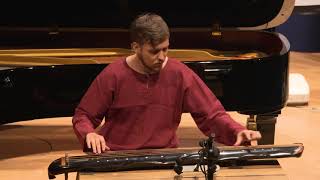 FaceArt faculty Jacob Charles Performing his Own Composition on Guqin