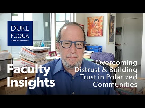 Overcoming Distrust and Building Trust in Polarized Communities