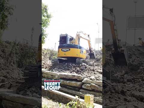 78us mini komatsu working under the main road