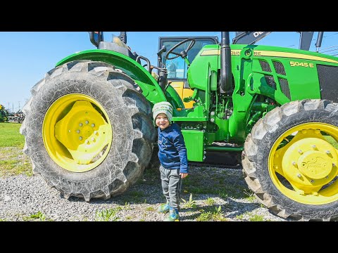 We visit a John Deere tractor store with all kinds of TRACTORS!