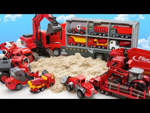 There are red heavy equipment on the sand  Let's take a look at what kind of vehicles there are