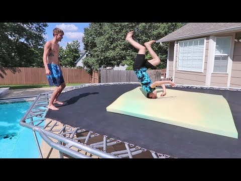 TEACHING MY UNATHLETIC BROTHER A BACKFLIP!