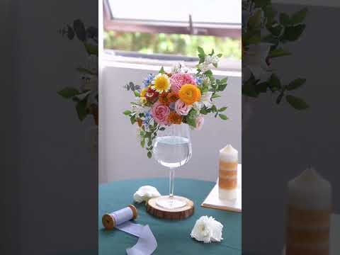 Flower Arrangement On Wine Glass