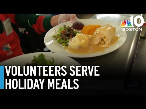 Volunteers serve holiday meals at St. Francis House