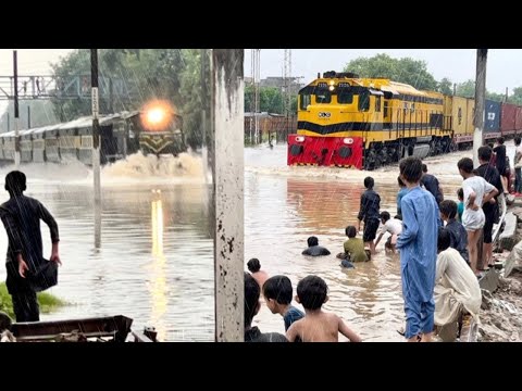 Karachi Express & Goods Train Dangerous & Heavy Raining Water Trains Passing