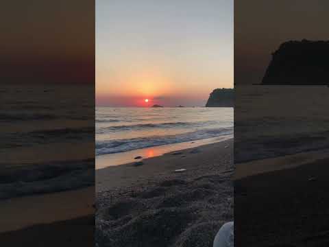 Beautiful sunset view at Buljarica beach in Montenegro filled with relaxing sounds of the sea.