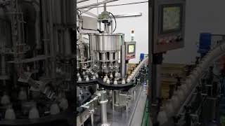 bottle washing , filling and capping machine(洗瓶、充填、旋蓋機）