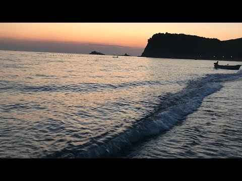 Beautiful sunset view at Buljarica beach in Montenegro filled with relaxing sounds of the sea.