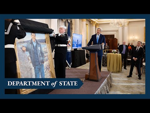 Secretary Blinken delivers remarks at a portrait unveiling of the 68th Secretary of State John Kerry