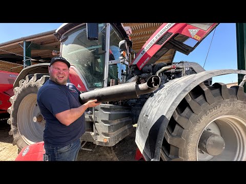 Harvest repairs (the wife comes to help move straw bales)