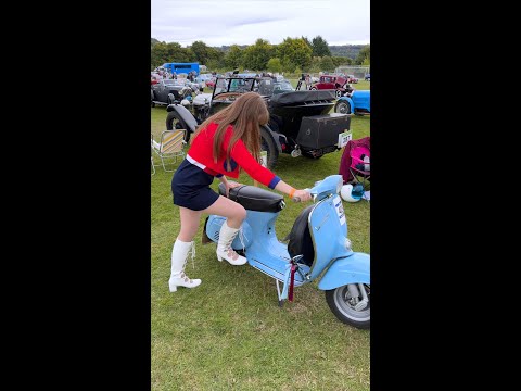 Cute Mod girl starts & rides her Vespa 90 up Kop Hill Climb