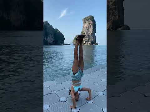 Headstand challenge on the moving boxes at the beach. #headstand