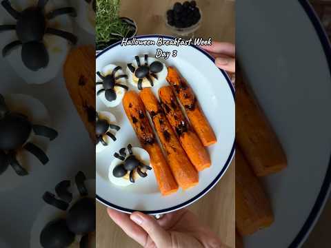 Boiled eggs with olive spiders and spooky roasted carrots🕷️