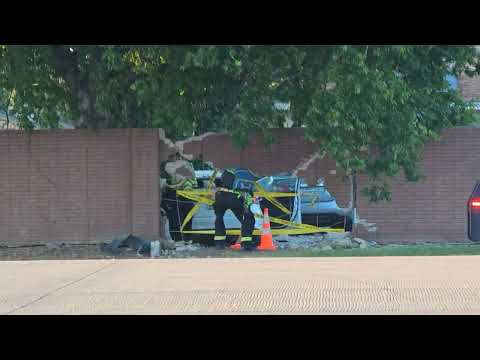 CAR CRASHED THROUGH BRICK WALL FLOWER MOUND TEXAS