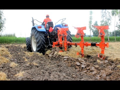 Fieldking Reversible Mould Board Plough in Paddy field