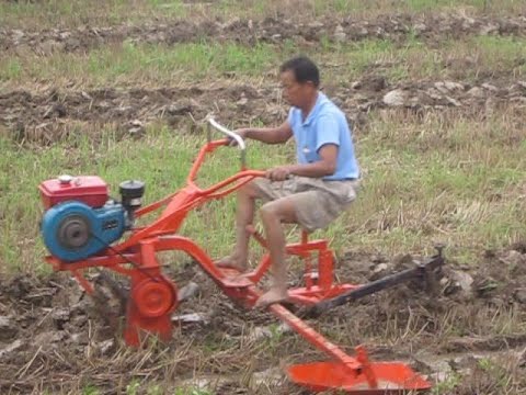 Latest model Mini Paddy Field Rice farm cultivator/rotary power tiller agricul tural tiller