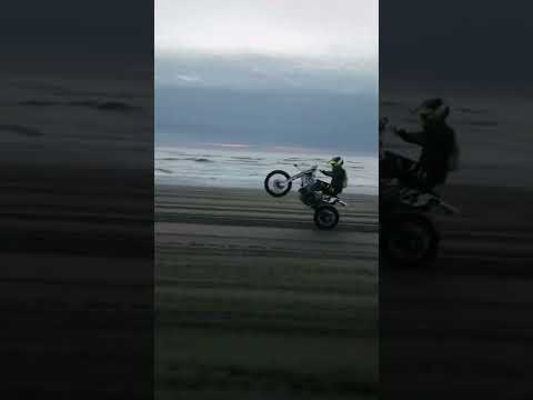 Riding a unicycle on the beach