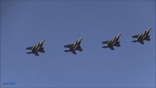 four F-15 Eagle fighter aircraft.overhead approach (fly in formation)