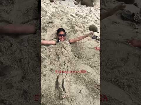 We buried her in the sand!😂 #lajollabeach #sandiego #asmr  #beachlife  #filbeautyinusa #omg #Shorts