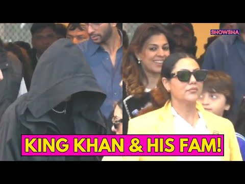 Shah Rukh Khan Hides His Face Under A Hoodie As He Arrives In Jamnagar With His Family | WATCH