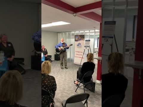 Frank Strong sings at Des Moines Downtown Chamber Meeting