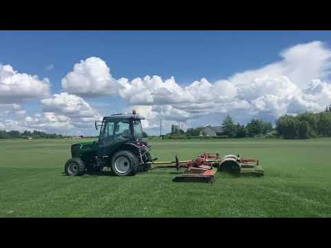 This is our 100Hp tarctor working cutting grass lawn in France, do you need such a tractor?