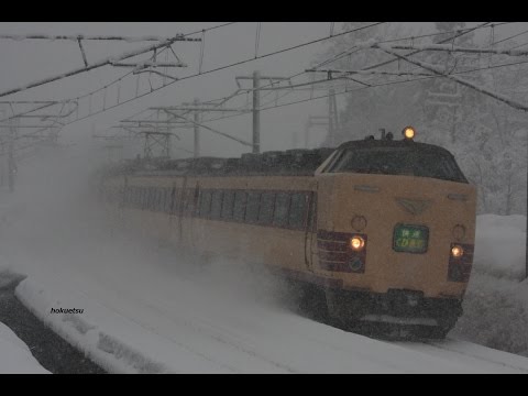 The Japanese express train and freight train which run in the snowstorm