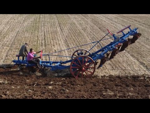 Farming using steam power. Farming the old fashioned way (ploughing and cultivating)