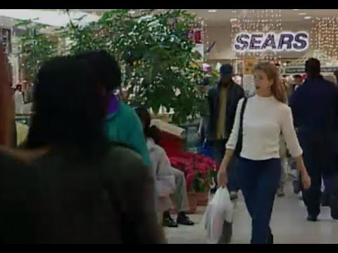 Watching Christmas shoppers at a mall in 2001