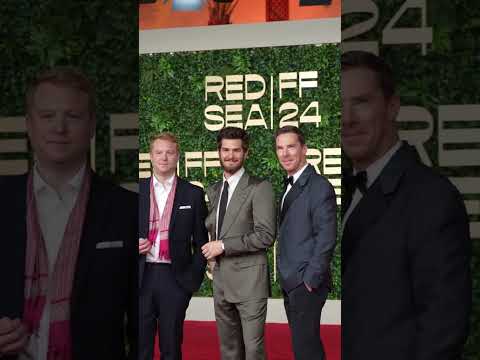 Andrew Garfield & Benedict Cumberbatch Are poses on the red carpet at the Red Sea Film Festival.