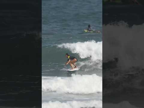 A beautiful surfer in the sea of Japan