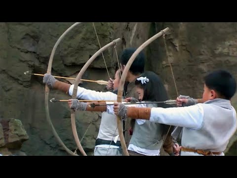 Brother and sister practice archery hard and kill Japanese soldiers with one arrow each