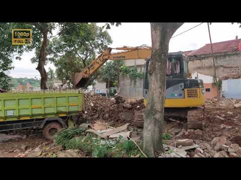 Mini Excavator Komatsu PC78US Clearing Debris